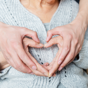 2 hands in the shape of a heart
